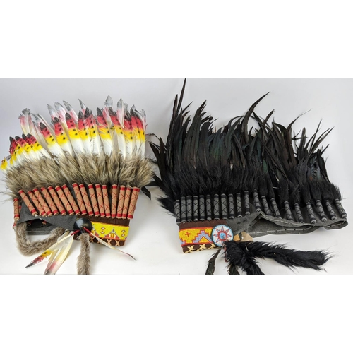 552 - CHIEF FEATHERED HEAD PIECE, a pair, recent production, late 20th century. (2)