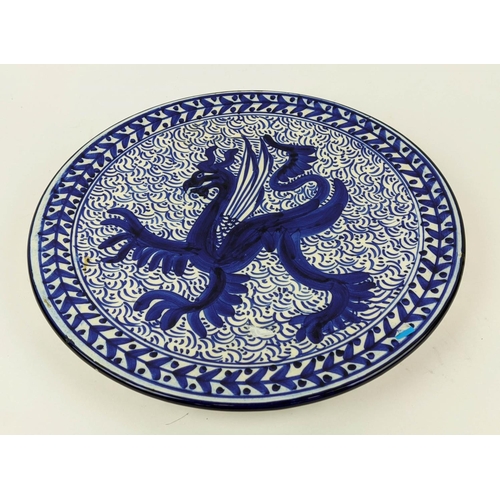 553 - CHARGER, blue and white hand painted, depicting a dragon, continental manufacture gold overall condi... 