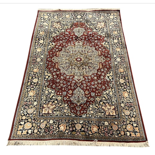 21 - FINE PURE SILK TEHRAN DESIGN RUG, 185cm x 121cm.