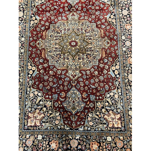 21 - FINE PURE SILK TEHRAN DESIGN RUG, 185cm x 121cm.