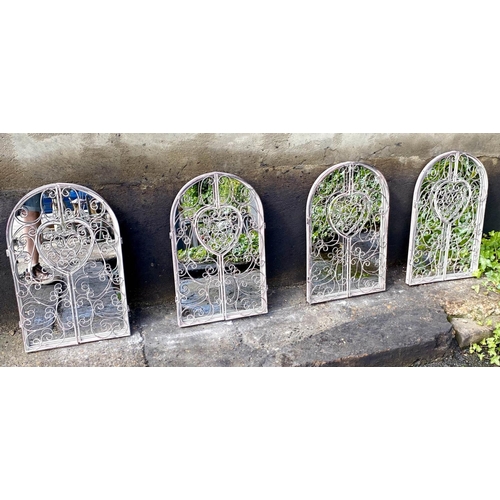 578 - ARCHITECTURAL GARDEN WALL MIRRORS, a set of four, gated design, 50cm x 32cm. (4)