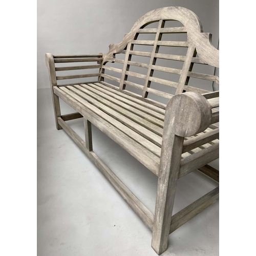 127 - LUTYENS STYLE GARDEN BENCH, silvery weathered teak of substantial slatted construction after a desig... 