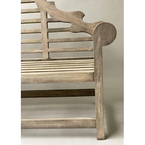 127 - LUTYENS STYLE GARDEN BENCH, silvery weathered teak of substantial slatted construction after a desig... 