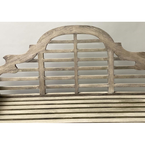 127 - LUTYENS STYLE GARDEN BENCH, silvery weathered teak of substantial slatted construction after a desig... 