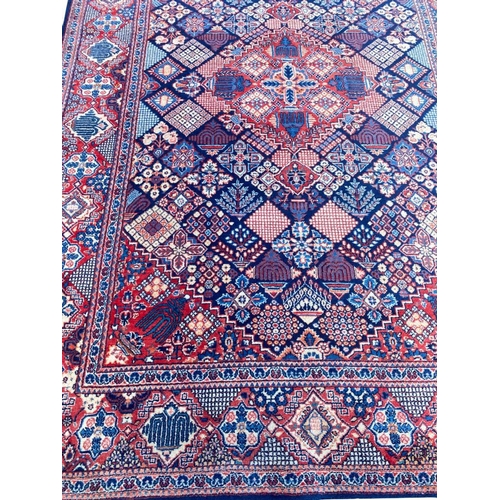 124 - ANTIQUE KASHAN RUG, 207cm x 140cm.