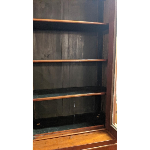 186 - GLAZED BOOKCASE, 76cm x 216cm H x 38cm, Victorian mahogany in two sections with fixed shelves.