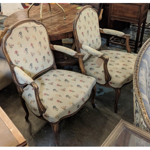 188 - FAUTEUILS, a pair, Louis XV style beechwood, each 68cm W x 97cm H, carved show frames and floral uph... 