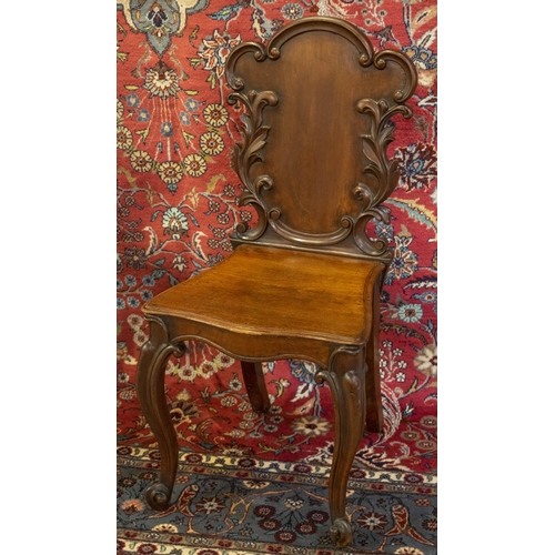 175 - HALL CHAIRS, 88cm H x 42cm, a pair, Victorian mahogany with foliate carved backs. (2)