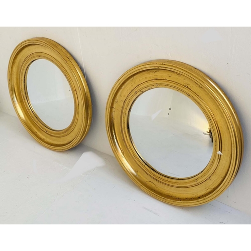 577 - CONVEX BUTLER WALL MIRRORS, a pair, Regency style, gilt frames, 74cm x 74cm. (2)