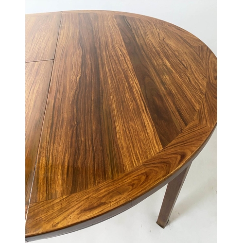 602 - EXTENDING DINING TABLE, 1970s exotic teak, rounded with two additional leaves, 73cm H x 115cm W x 19... 