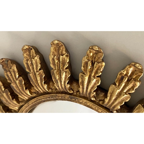 589 - CONVEX MIRRORS, a set of nine, gilt frames, various sizes, 26cm diam at largest. (9)