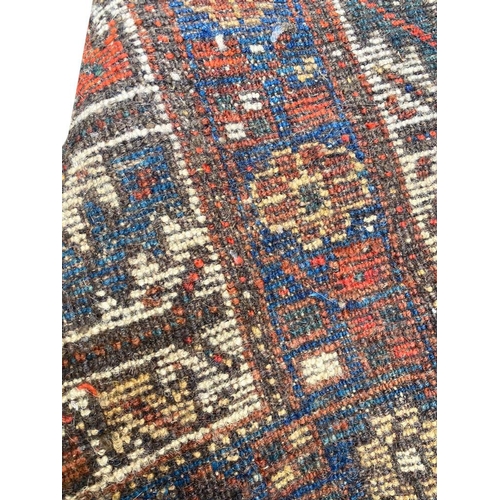 103 - ANTIQUE PERSIAN QASHQAI CARPET, 290cm x 210cm.