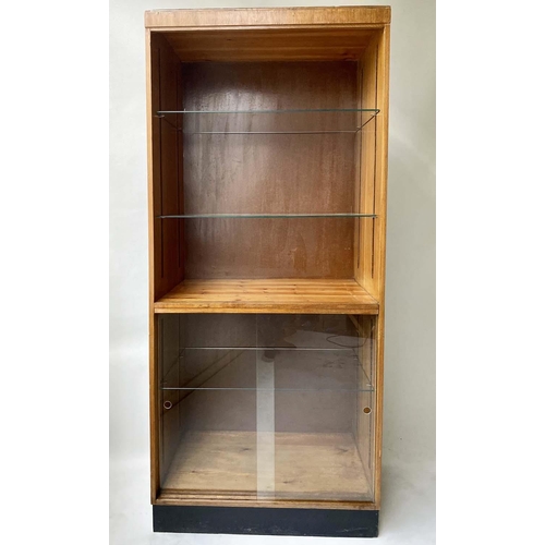 607 - HABERDASHERY DISPLAY CABINET, mid 20th century oak, with open shelved cabinet above two sliding glas... 