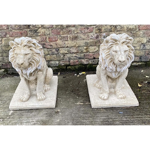 515 - SCULPTURAL LIONS, a pair, 70cm H, composite stone. (2)