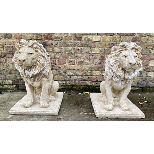 515 - SCULPTURAL LIONS, a pair, 70cm H, composite stone. (2)