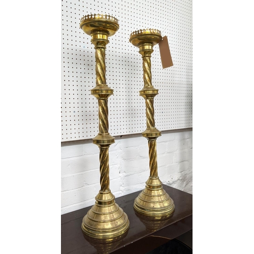 498 - CANDLESTICKS, a pair, 79cm H, German style, gilt metal. (2)