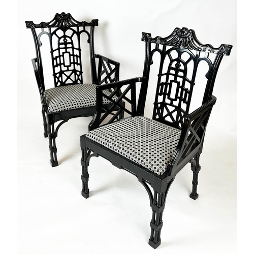 538 - OPEN ARMCHAIRS, a pair, 61cm x 106cm H, Chinese pagoda style, black gloss, Spanish 1960's. (2)