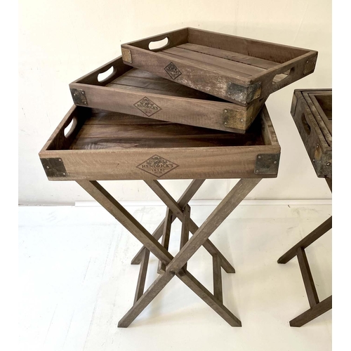 521 - BUTLERS TRAYS ON STANDS, a pair, each with a graduated set of three trays, 51.5cm x 33cm x 77cm at l... 