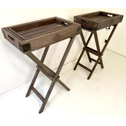 521 - BUTLERS TRAYS ON STANDS, a pair, each with a graduated set of three trays, 51.5cm x 33cm x 77cm at l... 