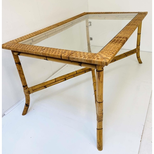 522 - RATTAN AND BAMBOO TABLE, 147cm x 88cm x 71cm, glass inserted top, 1970s Italian style.