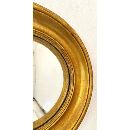 525 - CONVEX WALL MIRRORS, a set of 12, 26cm diam. at largest, Regency style, gilt frames, various sizes. ... 