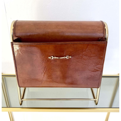 534 - MAGAZINE RACK, 38cm high, 39cm wide, 20cm deep, tanned leather and a gilt metal frame.