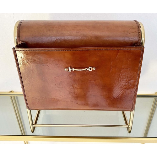 534 - MAGAZINE RACK, 38cm high, 39cm wide, 20cm deep, tanned leather and a gilt metal frame.