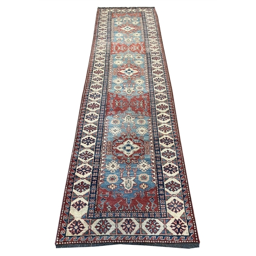 108 - KAZAK RUNNER, 310cm x 86cm.