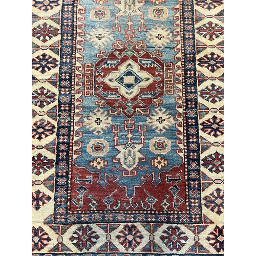 108 - KAZAK RUNNER, 310cm x 86cm.