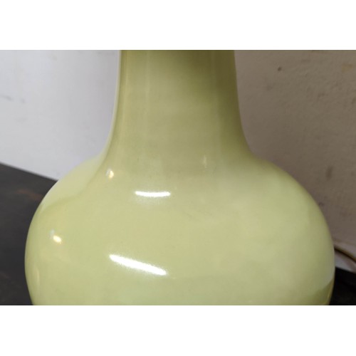 560 - TABLE LAMPS, a pair, 70cm H celadon green coloured, each with a white shade. (2)