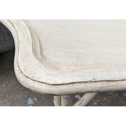 564 - LOW TABLE, 20th century, cream painted on wood, distressed, shaped tray top with pie crust edge, fol... 