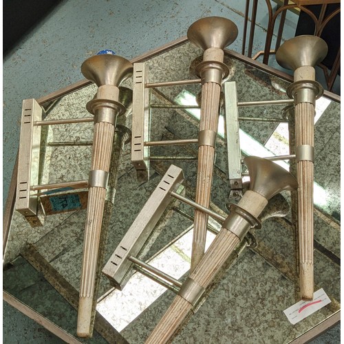 576 - BELLA FIGURA TORCHERES, a set of four, each 70cm H with glass dish shades and fluted distressed wood... 