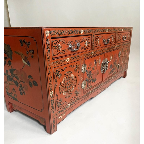 118 - LOW CHINESE SIDE CABINET, early 20th century scarlet lacquered with incised decoration, two cupboard... 