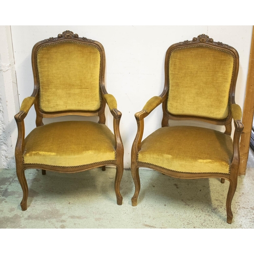 161 - FAUTEUILS, 101cm H x 62cm W x 59cm D, a pair, circa 1890, French walnut in gold plush. (2)