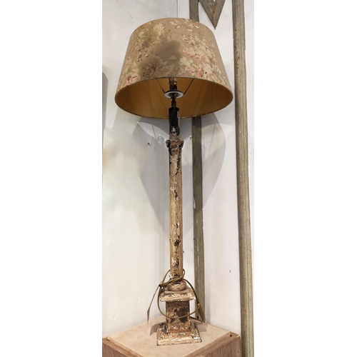 167 - TABLE LAMP, 93cm overall, including shade with a distressed painted column.