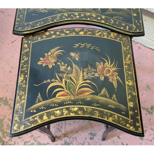 190 - NEST OF TWO TABLES, largest 38cm x 33cm x 68cm H, circa 1920, black and gilt Chinoiserie design. (2)