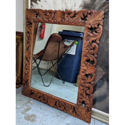 203 - WALL MIRROR, 86cm x 103cm, late 19th/early 20th century Continental oak with a foliate carved rectan... 