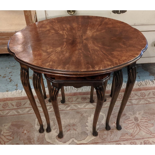 206 - NEST OF THREE TABLES, largest 53cm x 41cm, 20th century walnut the shaped oval tops on slender suppo... 