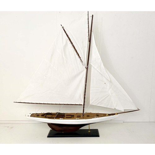 467 - SAILING BOAT MODEL, 150cm H x 150cm L x 21cm W, wooden frame, black plinth base.