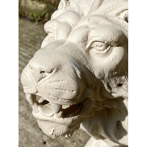 478 - CONTEMPORARY SCHOOL, sculptural roaring lions, a pair, each 42cm H x 55cm W x 22cm D, resin in a pai... 