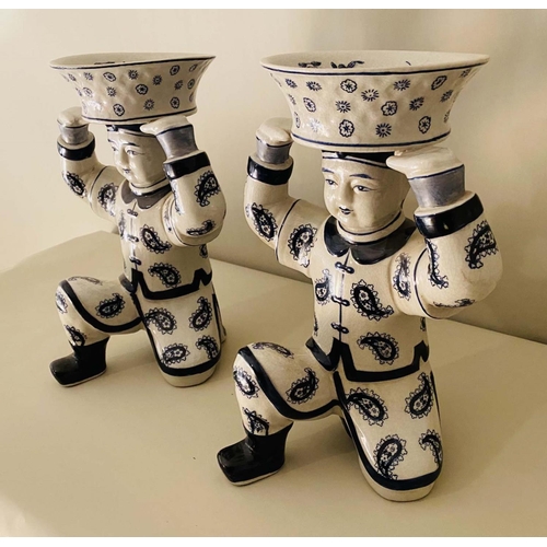 489 - FIGURAL SERVING DISHES, 33cm high, 23cm wide, 18cm deep, a pair, ceramic in the form of Chinese knee... 