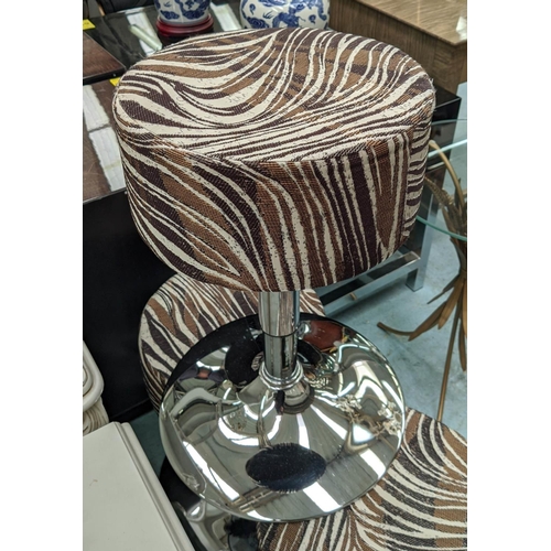 621 - STOOLS, a set of three, each 35cm W c 57cm H, zebra striped fabric. (3)