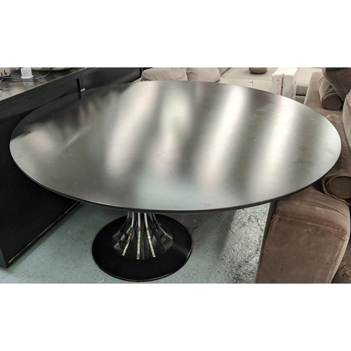 626 - CIRCULAR BLACK TOPPED DINING TABLE, 137cm wide x 76cm H, with polished metal base.