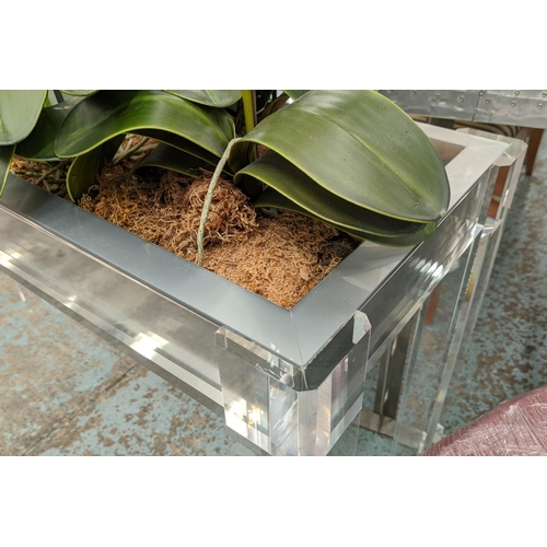 629 - PERSPEX JARDINIERE, 39cm D x 80cm H x 123cm W, with faux orchids.