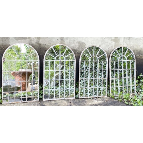 597 - ARCHITECTURAL GARDEN MIRRORS, a set of four, arched metal frames, 60cm x 36cm. (4)