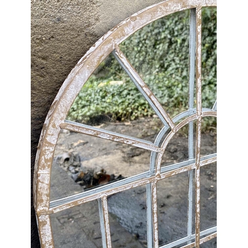 597 - ARCHITECTURAL GARDEN MIRRORS, a set of four, arched metal frames, 60cm x 36cm. (4)