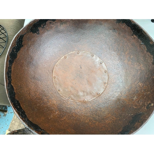 487 - INDIAN KADAI FIRE BOWLS ON STANDS, a set of five, 46cm diam. at largest, of various sizes. (5)