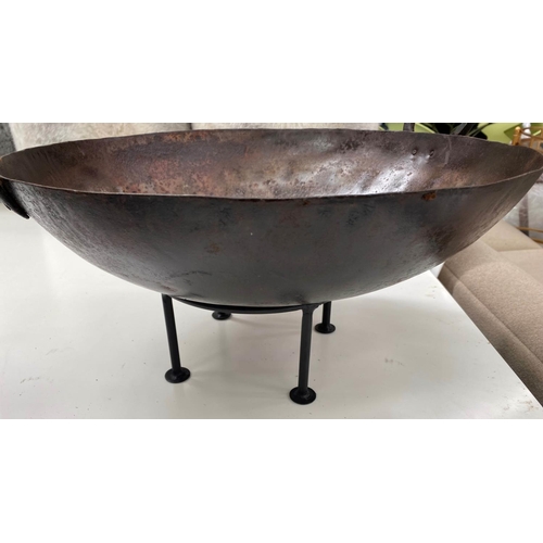 487 - INDIAN KADAI FIRE BOWLS ON STANDS, a set of five, 46cm diam. at largest, of various sizes. (5)