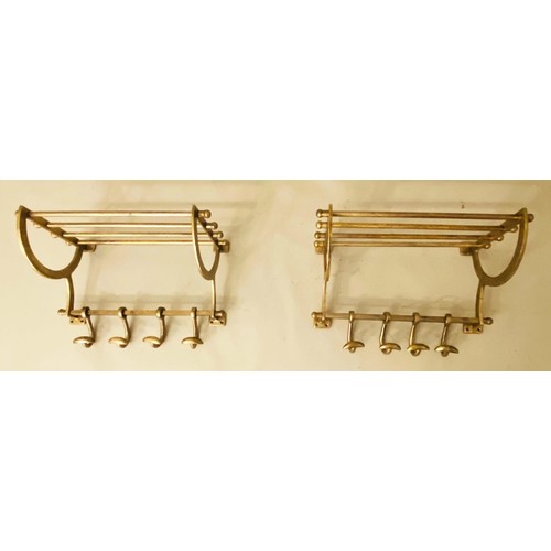 650 - WALL MOUNTING LUGGAGE RACKS, a pair, gilt metal, 35cm x 46cm x 26cm. (2)