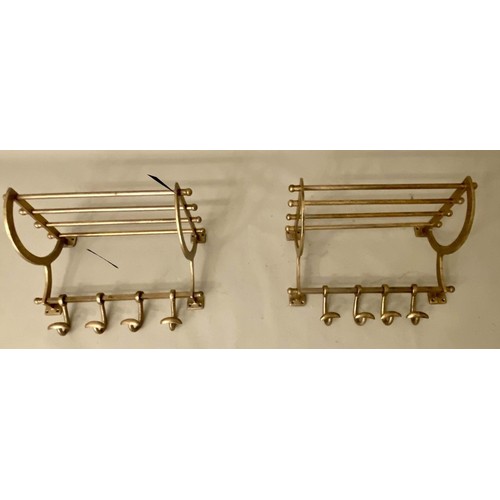 650 - WALL MOUNTING LUGGAGE RACKS, a pair, gilt metal, 35cm x 46cm x 26cm. (2)